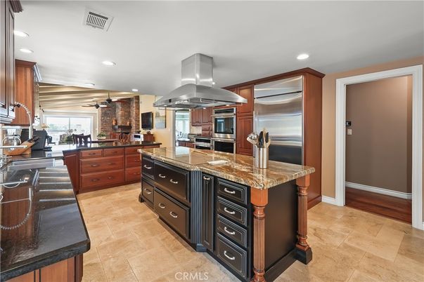 Interior, Kitchen, Recessed Lighting, Stainless Steel Appliances, Stone Walls