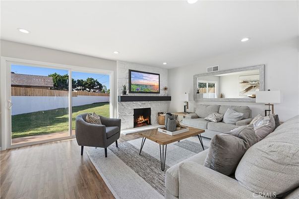 Fireplace, Interior, Living room, Recessed Lighting, Wood Texture Flooring