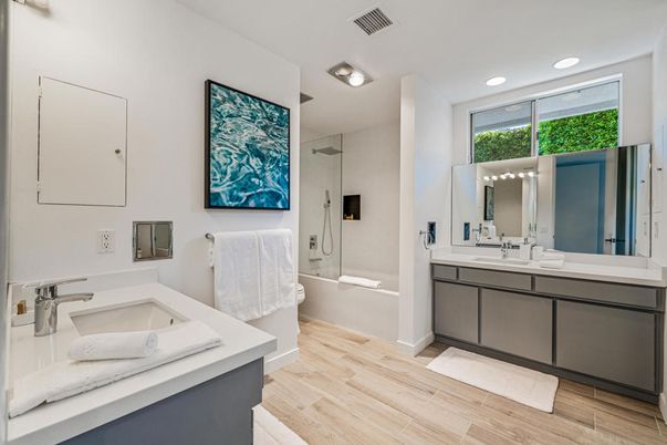 Bathroom, Dual Sink Vanities, Glass Shower, Interior, Recessed Lighting, Wood Texture Flooring