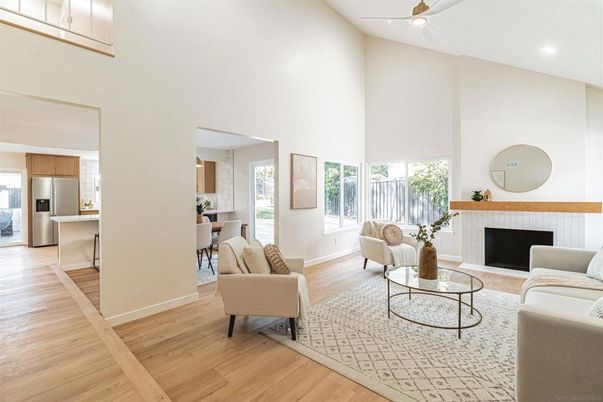 Dining room, Fireplace, Interior, Kitchen, Living room, Recessed Lighting, Stainless Steel Appliances, Wood Texture Flooring