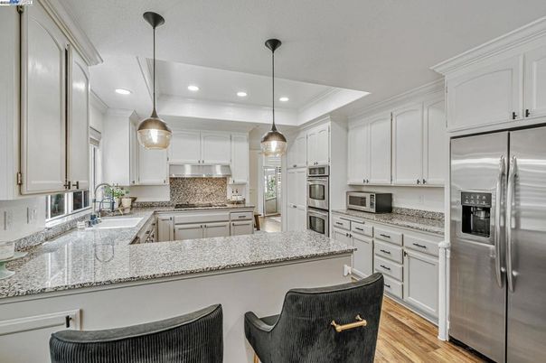 Interior, Kitchen, Pendant Lights, Recessed Lighting, Stainless Steel Appliances, Wood Texture Flooring