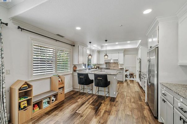 Interior, Kitchen, Pendant Lights, Recessed Lighting, Stainless Steel Appliances, Wood Texture Flooring