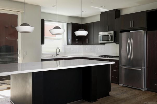 Interior, Kitchen, Pendant Lights, Recessed Lighting, Stainless Steel Appliances, Wood Texture Flooring