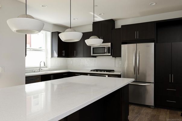 Interior, Kitchen, Pendant Lights, Recessed Lighting, Stainless Steel Appliances, Wood Texture Flooring