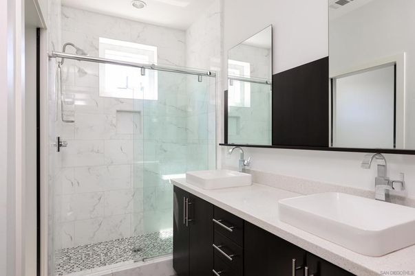 Bathroom, Dual Sink Vanities, Glass Shower, Interior, Marble Walls, Recessed Lighting