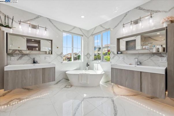 Bathroom, Dual Sink Vanities, Free Standing Baths, Interior, Marble, Marble Walls, Recessed Lighting