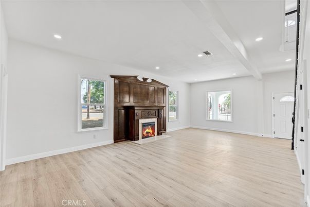 Empty room, Fireplace, Interior, Recessed Lighting, Wood Texture Flooring