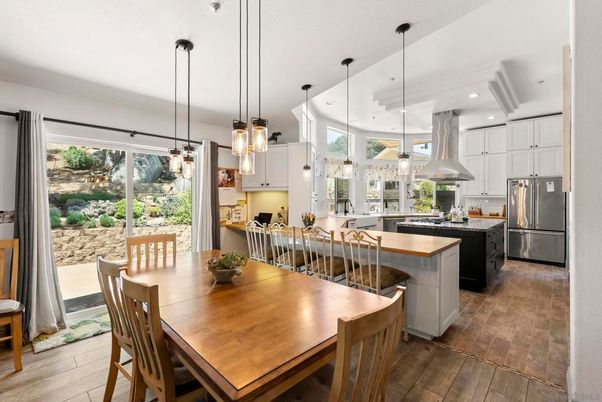 Dining room, Interior, Kitchen, Pendant Lights, Recessed Lighting, Stainless Steel Appliances, Wood Texture Flooring