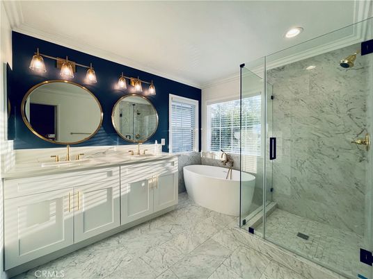 Bathroom, Dual Sink Vanities, Free Standing Baths, Glass Shower, Interior, Marble, Marble Walls, Recessed Lighting