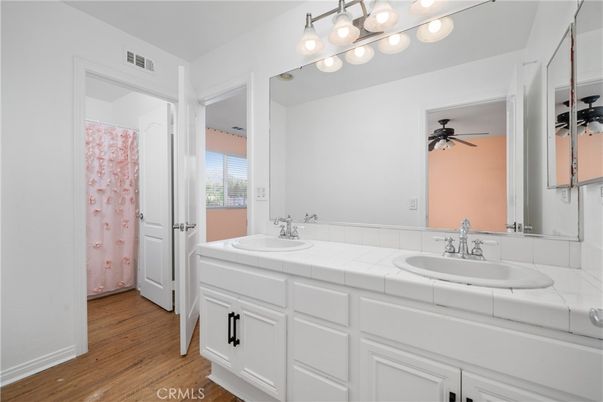 Bathroom, Dual Sink Vanities, Interior, Tile Countertops, Wood Texture Flooring