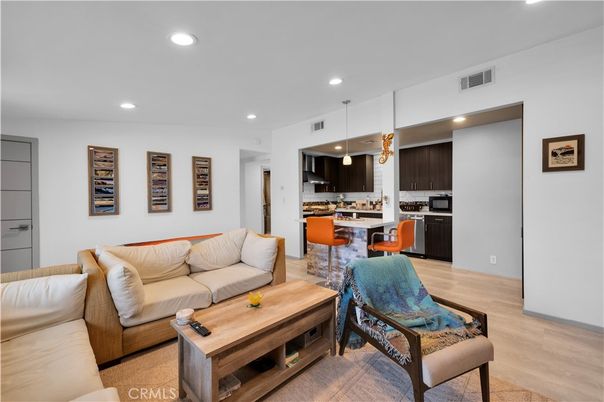 Dining room, Interior, Kitchen, Living room, Pendant Lights, Recessed Lighting, Stainless Steel Appliances, Wood Texture Flooring