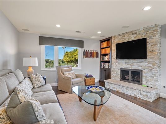 Fireplace, Interior, Living room, Recessed Lighting, Stone Walls, Wood Texture Flooring
