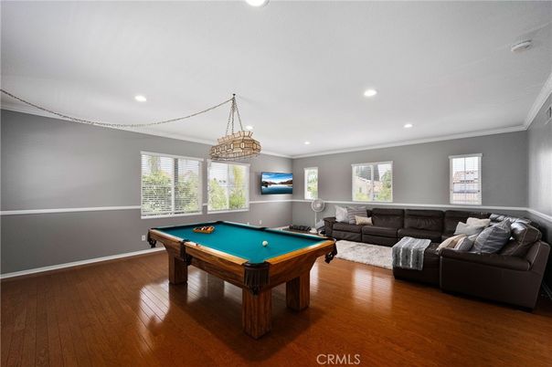 Billiard Table, Chandelier, Game Room, Interior, Living room, Recessed Lighting, Wood Texture Flooring