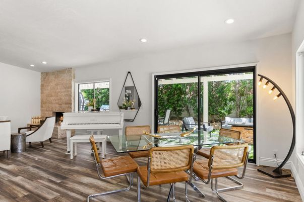 Dining room, Fireplace, Interior, Piano, Recessed Lighting, Stone Walls, Wood Texture Flooring