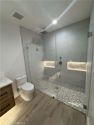 Bathroom, Glass Shower, Interior, Recessed Lighting, Wood Texture Flooring