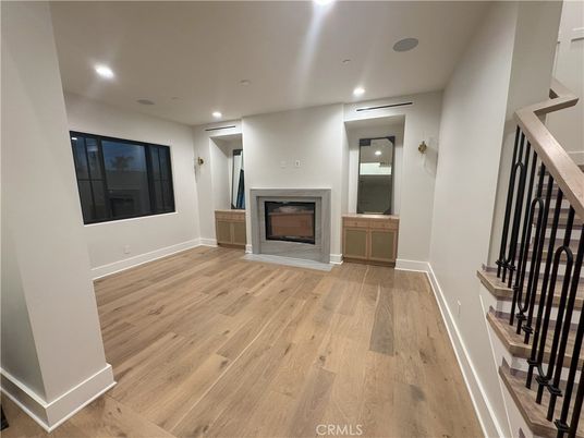 Empty room, Fireplace, Interior, Recessed Lighting, Wood Texture Flooring