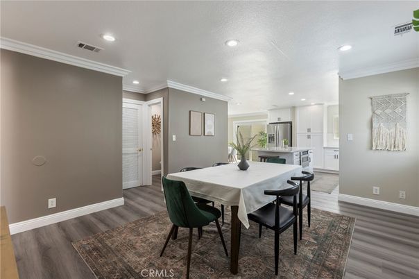 Dining room, Interior, Kitchen, Recessed Lighting, Stainless Steel Appliances, Wood Texture Flooring
