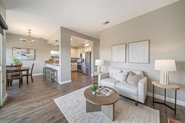 Chandelier, Dining room, Interior, Kitchen, Living room, Pendant Lights, Recessed Lighting, Stainless Steel Appliances, Wood Texture Flooring