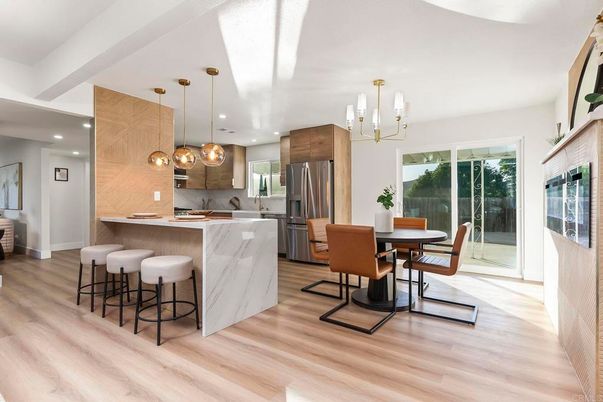 Dining room, Interior, Kitchen, Pendant Lights, Recessed Lighting, Stainless Steel Appliances, Wood Texture Flooring