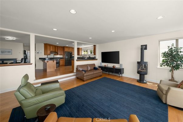 Fireplace, Interior, Kitchen, Living room, Recessed Lighting, Stainless Steel Appliances, Wood Texture Flooring