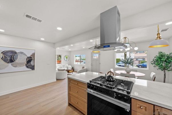 Dining room, Interior, Kitchen, Living room, Recessed Lighting, Stainless Steel Appliances, Wood Texture Flooring