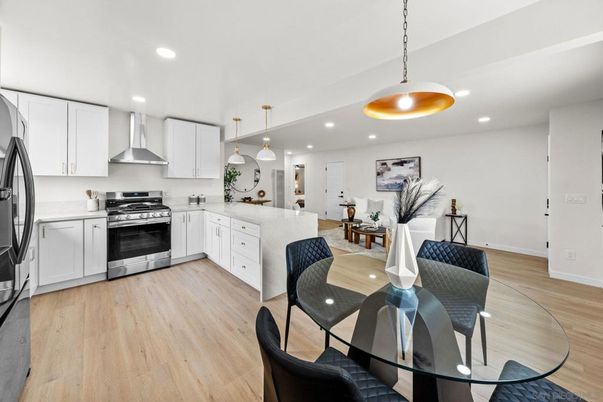 Dining room, Interior, Kitchen, Living room, Pendant Lights, Recessed Lighting, Stainless Steel Appliances, Wood Texture Flooring