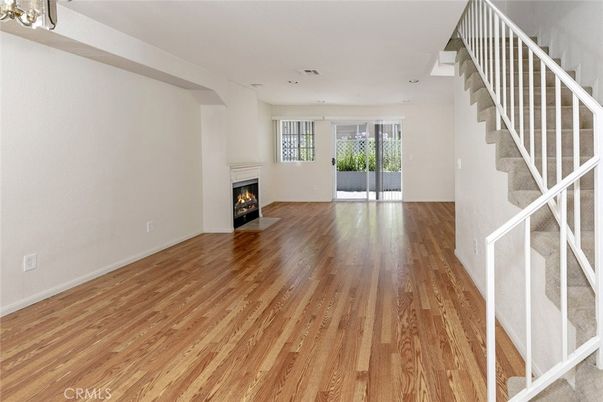Empty room, Fireplace, Interior, Recessed Lighting, Wood Texture Flooring