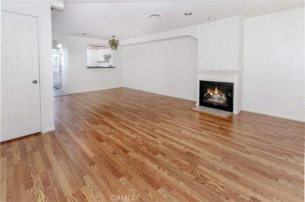 Empty room, Fireplace, Interior, Recessed Lighting, Wood Texture Flooring