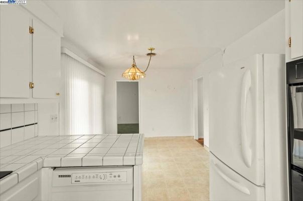 Interior, Kitchen, Pendant Lights, Tile Countertops