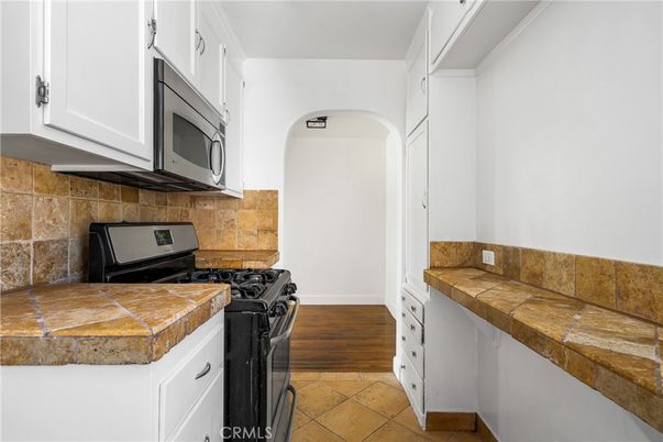Interior, Kitchen, Tile Countertops, Wood Texture Flooring