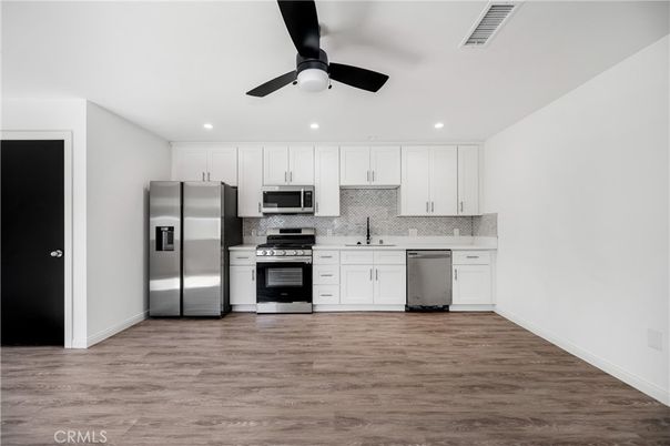 Interior, Kitchen, Recessed Lighting, Stainless Steel Appliances, Wood Texture Flooring