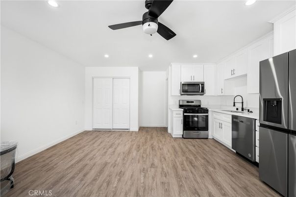 Interior, Kitchen, Recessed Lighting, Stainless Steel Appliances, Wood Texture Flooring