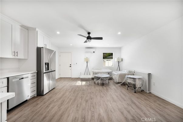 Dining room, Interior, Kitchen, Recessed Lighting, Stainless Steel Appliances, Wood Texture Flooring