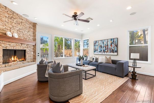 Fireplace, Interior, Living room, Recessed Lighting, Stone Walls, Wood Texture Flooring