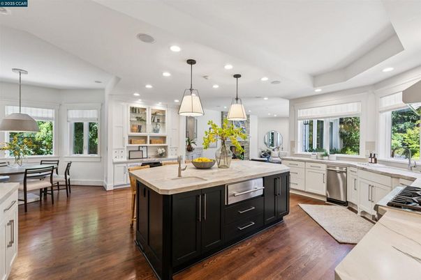 Dining room, Interior, Kitchen, Pendant Lights, Recessed Lighting, Stainless Steel Appliances, Wood Texture Flooring