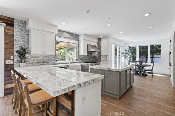Dining room, Interior, Kitchen, Recessed Lighting, Stainless Steel Appliances, Wood Texture Flooring