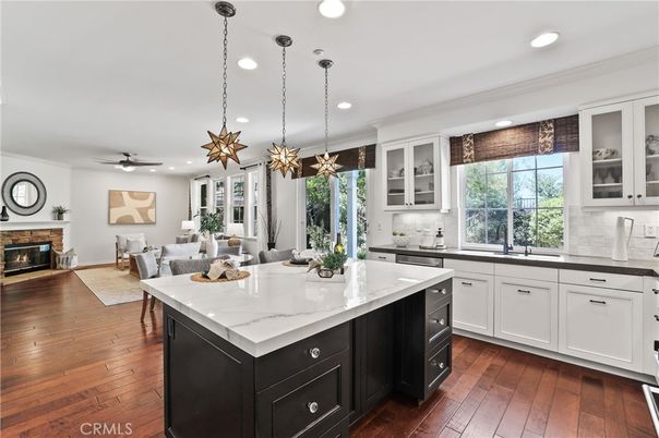 Dining room, Fireplace, Interior, Kitchen, Pendant Lights, Recessed Lighting, Wood Texture Flooring