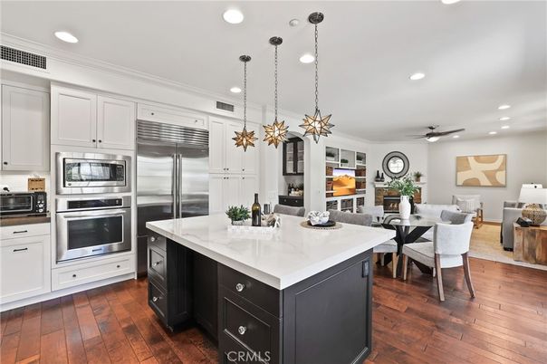 Dining room, Interior, Kitchen, Living room, Pendant Lights, Recessed Lighting, Stainless Steel Appliances, Wood Texture Flooring