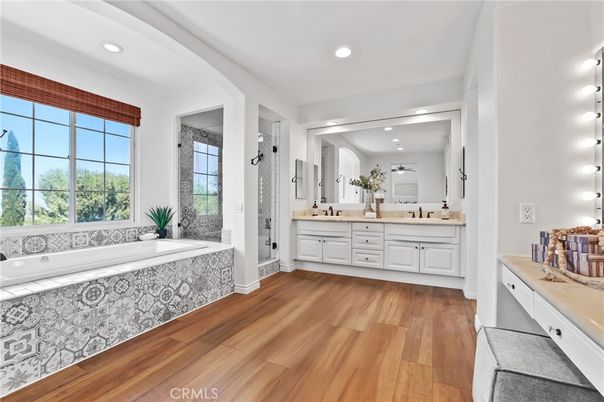 Bathroom, Dual Sink Vanities, Interior, Recessed Lighting, Wood Texture Flooring