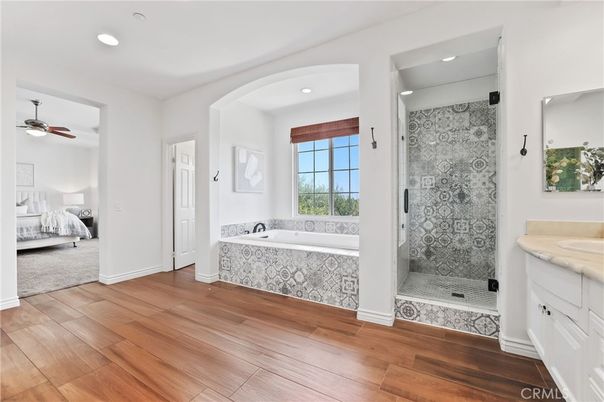 Bathroom, Bedroom, Glass Shower, Interior, Recessed Lighting, Wood Texture Flooring