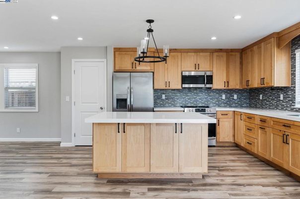 Interior, Kitchen, Pendant Lights, Recessed Lighting, Stainless Steel Appliances, Wood Texture Flooring