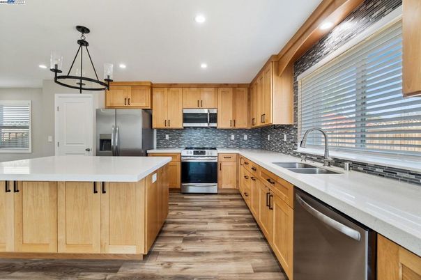 Interior, Kitchen, Pendant Lights, Recessed Lighting, Stainless Steel Appliances, Wood Texture Flooring