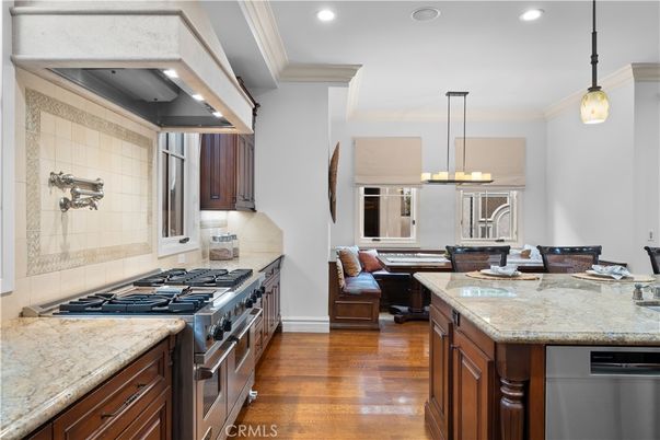 Dining room, Interior, Kitchen, Pendant Lights, Recessed Lighting, Stainless Steel Appliances, Wood Texture Flooring