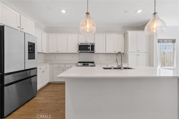 Interior, Kitchen, Pendant Lights, Recessed Lighting, Stainless Steel Appliances, Wood Texture Flooring