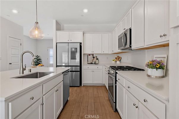 Interior, Kitchen, Pendant Lights, Recessed Lighting, Stainless Steel Appliances, Wood Texture Flooring