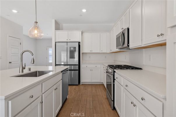 Interior, Kitchen, Pendant Lights, Recessed Lighting, Stainless Steel Appliances, Wood Texture Flooring
