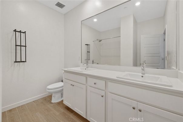 Bathroom, Dual Sink Vanities, Interior, Recessed Lighting, Wood Texture Flooring