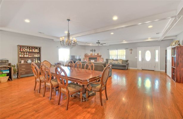 Chandelier, Dining room, Fireplace, Interior, Living room, Recessed Lighting, Wood Texture Flooring