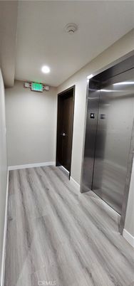 Elevator, Interior, Recessed Lighting, Wood Texture Flooring