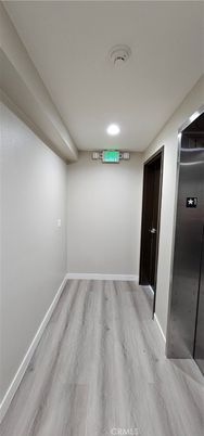 Elevator, Empty room, Interior, Recessed Lighting, Wood Texture Flooring